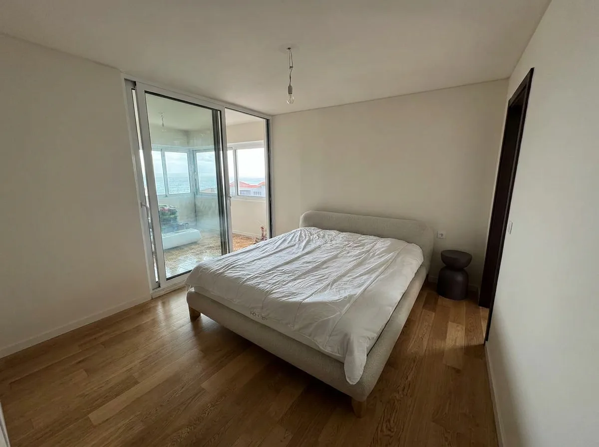 The Caniço apartment bedroom, bare before our setup